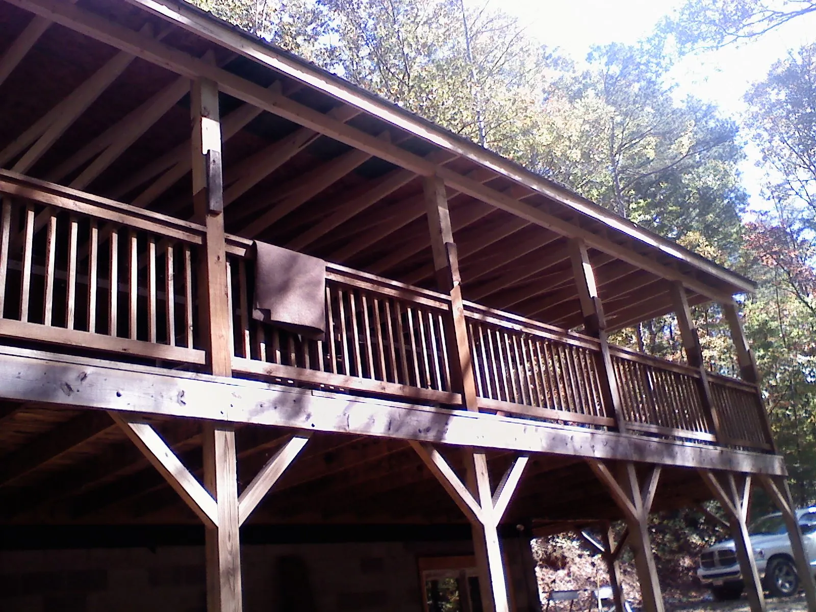 Timber framing under a new elevated porch and deck — Roof Leak Repair in Camillus by Roofing Brothers